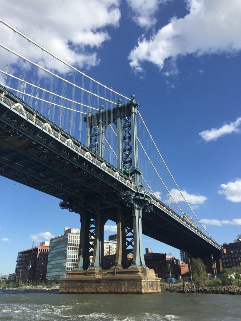 Picture of the Manhattan Bridge taken from a boat. 